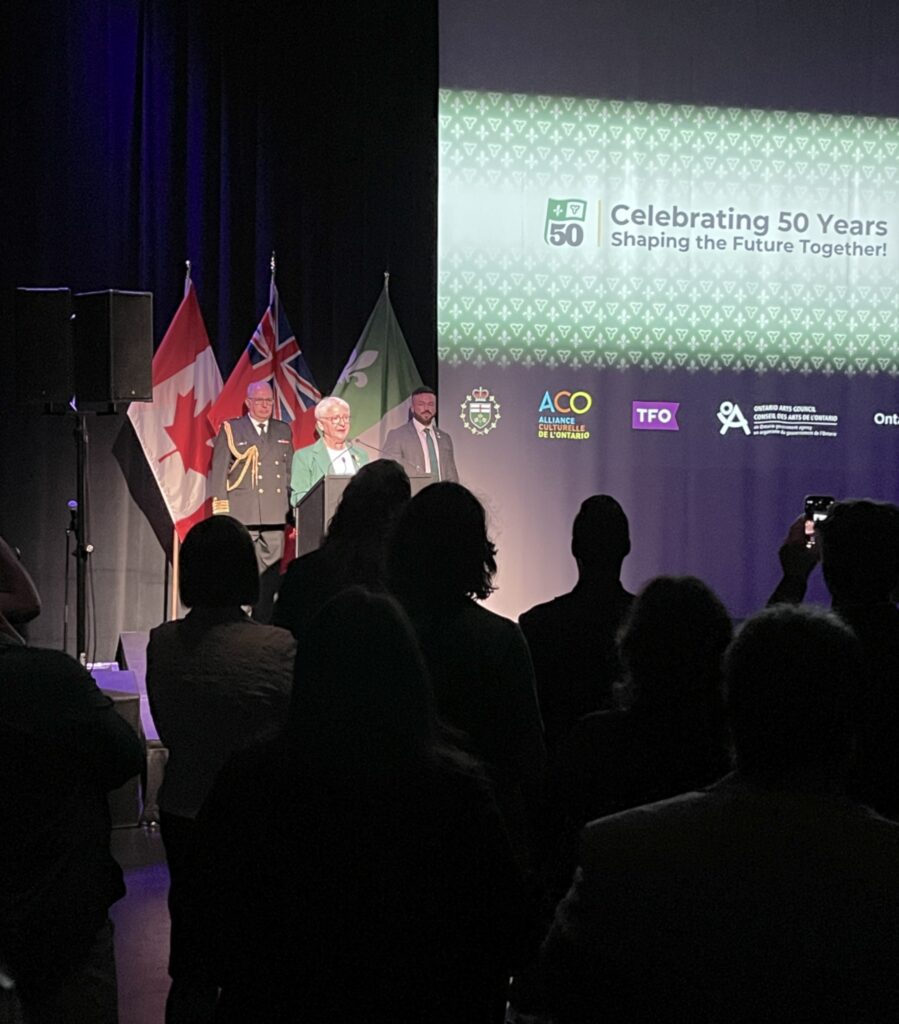 The Honourable Edith Dumont giving remarks