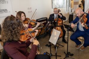 A group of musicians playing their instruments